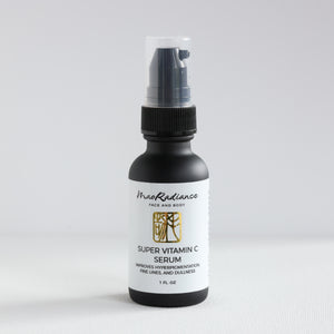 Super Vitamin C Serum bottle with black spray nozzle on a white background