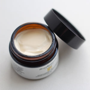 close up of Glass jar of face cream for aging skin and mature skin that is part of a natural anti age skin care line made with all natural skin care ingredients