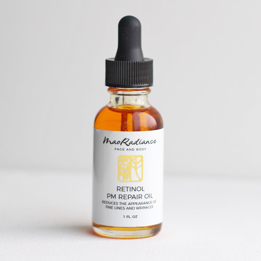 glass bottle of Natural Retinol Oil Rosehip Oil with Retinol Skin Brightener - a natural retinol alternative