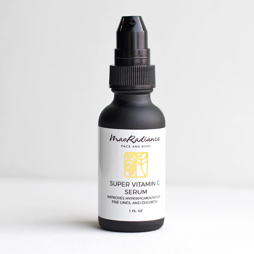 bottle of vitamin c with ferulic acid serum as part of a clean beauty brands all natural skincare ingredients 